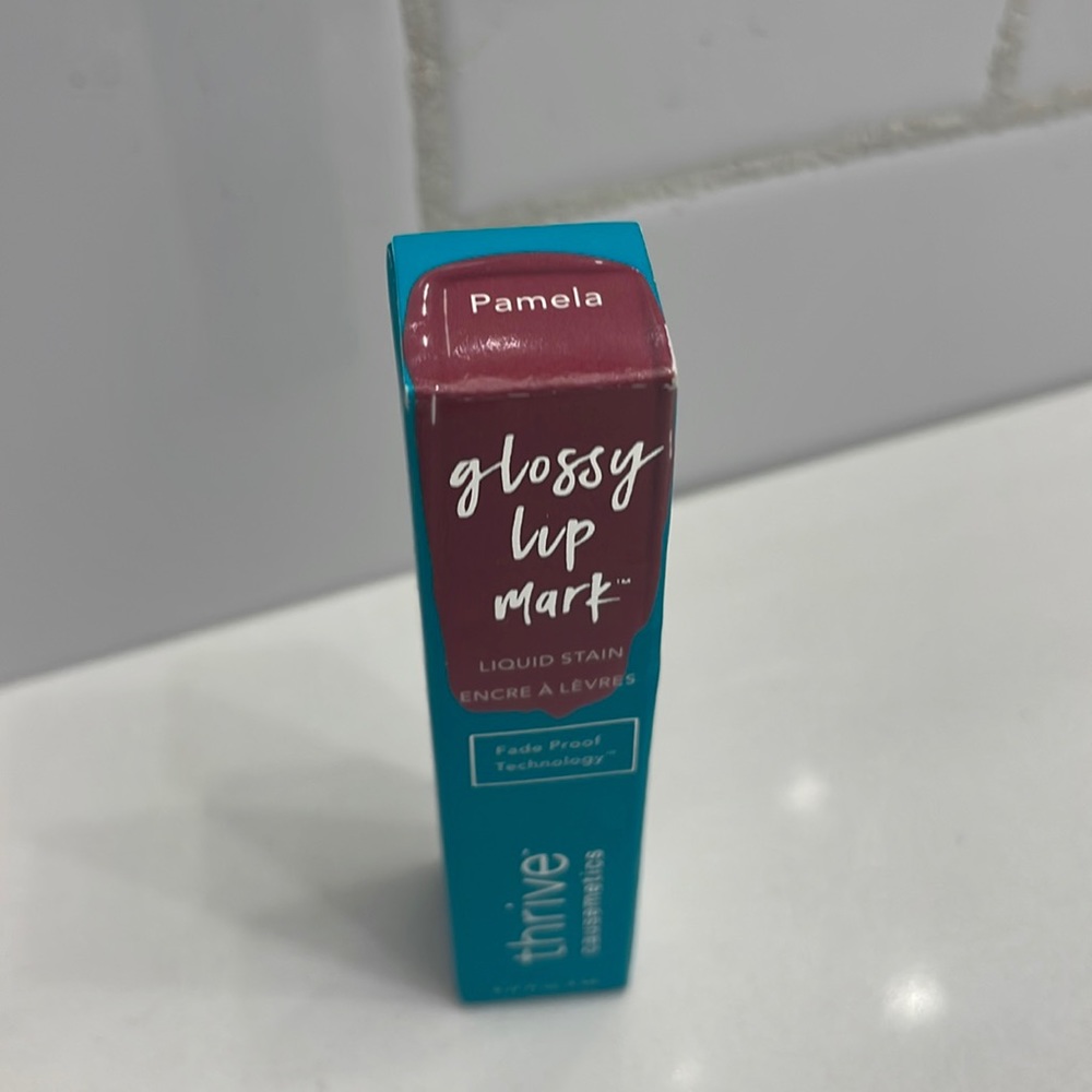 Thrive cosmetics lipgloss in Pamela. New in box